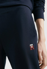 Tommy Hilfiger TAPERED MONOGRAM  Tracksuit bottoms desert sky TAPERED MONOGRAM Спортивные брюки небо пустыни