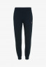 Tommy Hilfiger TAPERED MONOGRAM Tracksuit bottoms desert sky TAPERED MONOGRAM Спортивные брюки небо пустыни