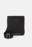 Tommy Hilfiger CENTRAL MINI CROSSOVER UNISEX Across body bag black CENTRAL MINI CROSSOVER UNISEX Сумка через плечо черный