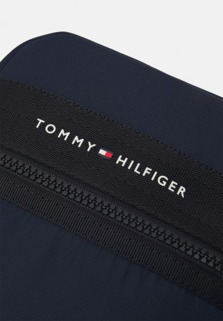 Tommy Hilfiger HORIZON MINI REPORTER UNISEX Across body bag space blue HORIZON MINI REPORTER UNISEX Сумка через плечо космический синий