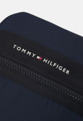 Tommy Hilfiger HORIZON MINI REPORTER UNISEX Across body bag space blue HORIZON MINI REPORTER UNISEX Сумка через плечо космический синий