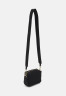 Tommy Hilfiger FLOW CROSSOVER Across body bag black FLOW CROSSOVER Сумка через плечо черный