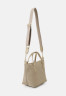 Tommy Hilfiger POPPY SMALL TOTE Handbag beige POPPY SMALL TOTE Сумочка бежевый