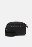 Tommy Hilfiger CENTRAL REPREVE REPORTER UNISEX Across body bag black CENTRAL REPREVE REPORTER UNISEX Сумка через плечо черный