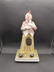 Музыкальная шкатулка винтажная Melody in Motion "Клон с флейтой", ручная роспись, бисквитный фарфор, 32 см, Германия, 1970-80гг.