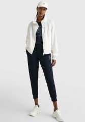 Tommy Hilfiger SPORT MONOGRAM CUFFED  Tracksuit bottoms desert sky SPORT MONOGRAM CUFFED Спортивные брюки небо пустыни