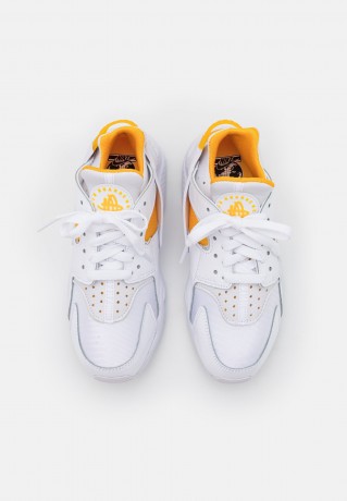 Nike Sportswear W AIR HUARACHE ESS SNKR Sneaker low white/university gold W AIR HUARACHE ESS SNKR Низкие кроссовки женские белый/университетское золото