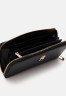 Tommy Hilfiger ICONIC SOLID Wallet black ICONIC SOLID Бумажник черный
