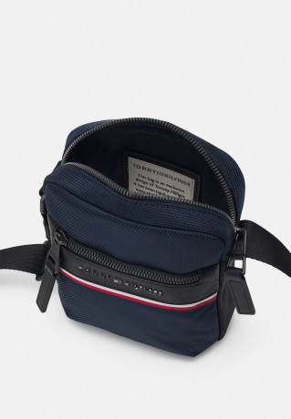 Tommy Hilfiger 1985 MINI REPORTER UNISEX Across body bag desert sky 1985 MINI REPORTER UNISEX — Сумка через плечо небо пустыни