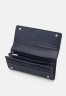 Tommy Hilfiger EMBLEM LARGE FLAP CORP Wallet space blue EMBLEM LARGE FLAP CORP Бумажник космический синий