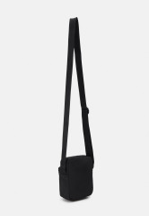Tommy Hilfiger SKYLINE MINI REPORTER UNISEX Across body bag black SKYLINE MINI REPORTER UNISEX Сумка через плечо черный