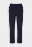 Tommy Hilfiger TAPERED PUNTO PANT Trousers desert sky ЗАУЖЕННЫЕ БРЮКИ PUNTO Брюки небо пустыни