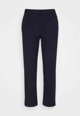 Tommy Hilfiger TAPERED PUNTO PANT Trousers desert sky ЗАУЖЕННЫЕ БРЮКИ PUNTO Брюки небо пустыни