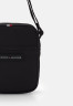 Tommy Hilfiger ESSENTIAL MINI RPORTER UNISEX Across body bag black ESSENTIAL MINI RPORTER UNISEX Сумка через плечо черный