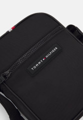 Tommy Hilfiger ESSENTIAL MINI RPORTER UNISEX Across body bag black ESSENTIAL MINI RPORTER UNISEX Сумка через плечо черный