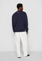 Tommy Hilfiger TOMMY HILFIGER X SHAWN MENDES CREWNECK UNISEX Sweatshirt carbon navy TOMMY HILFIGER X SHAWN MENDES CREWNECK UNISEX Толстовка углеродный флот